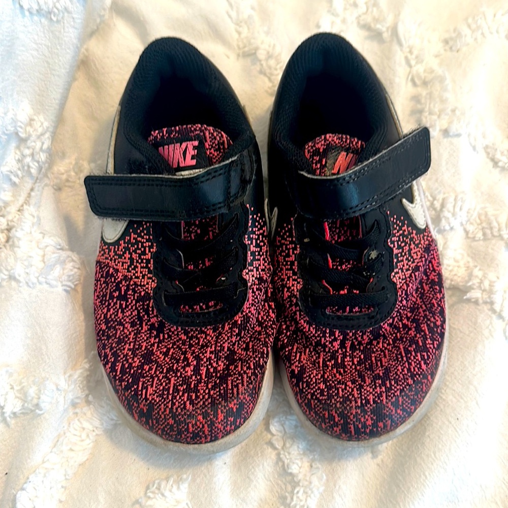 Black and pink girls Nikes
